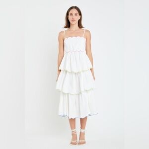 Tiered Scallop Sleeveless Midi Dress
English Factory